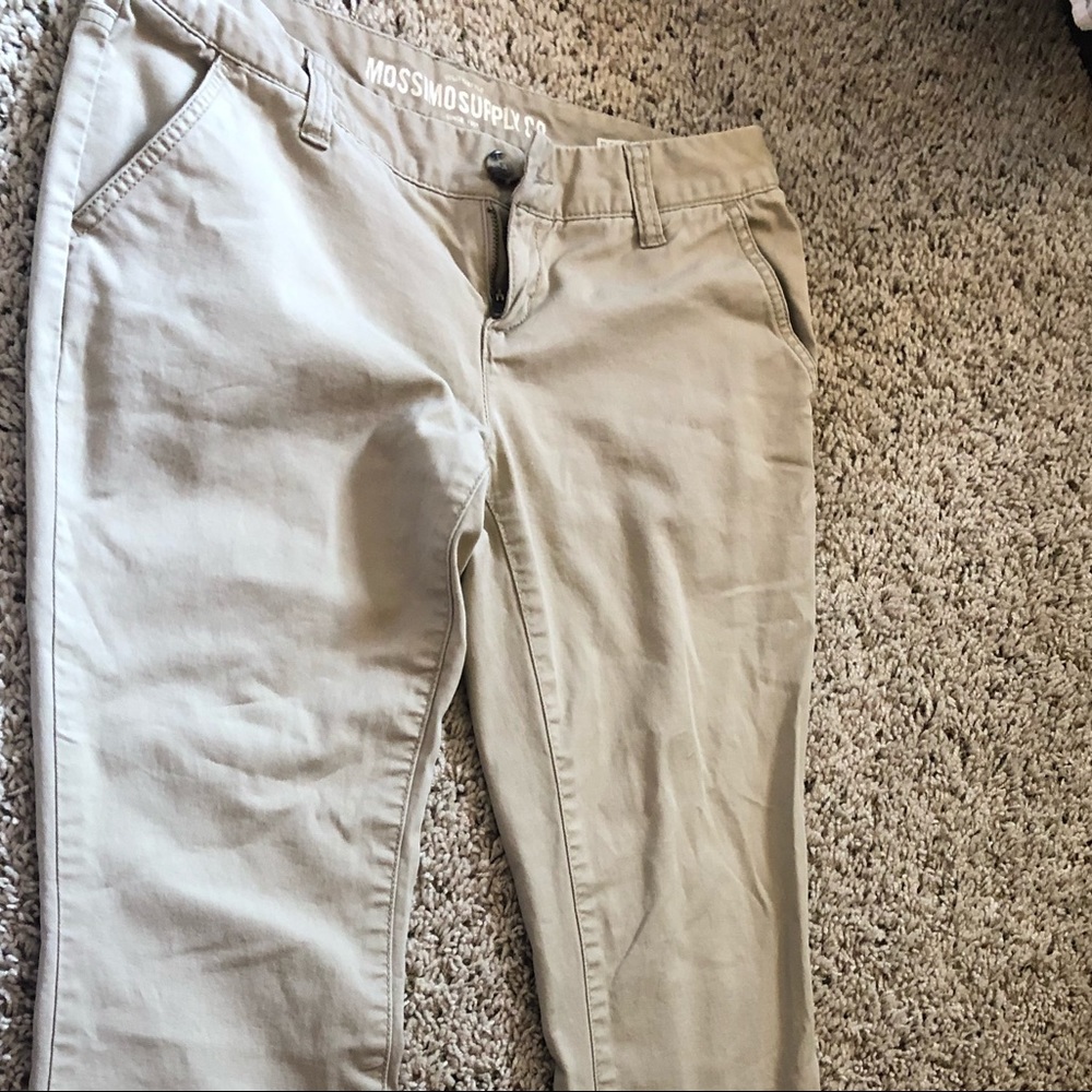 Boot cut khaki pants.